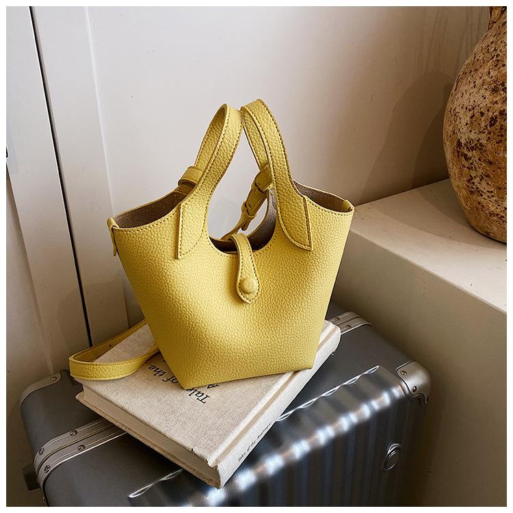 Wholesale 2025 new niche lychee pattern handbag bag women's Korean version simple bucket bag casual messenger bag