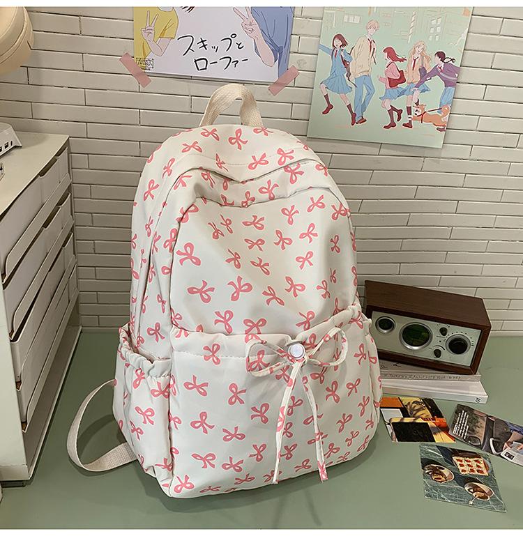 Schoolbag bow schoolbag junior high school girls ins style high value 1011 new college students Japanese travel backpack