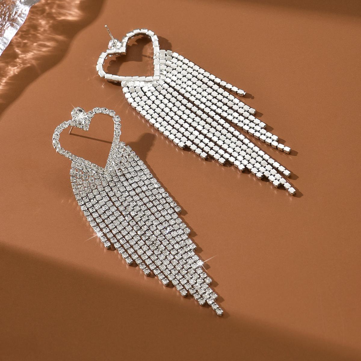 Cross border new fashionable heart earrings, feminine temperament, luxurious diamond studded earrings, earrings