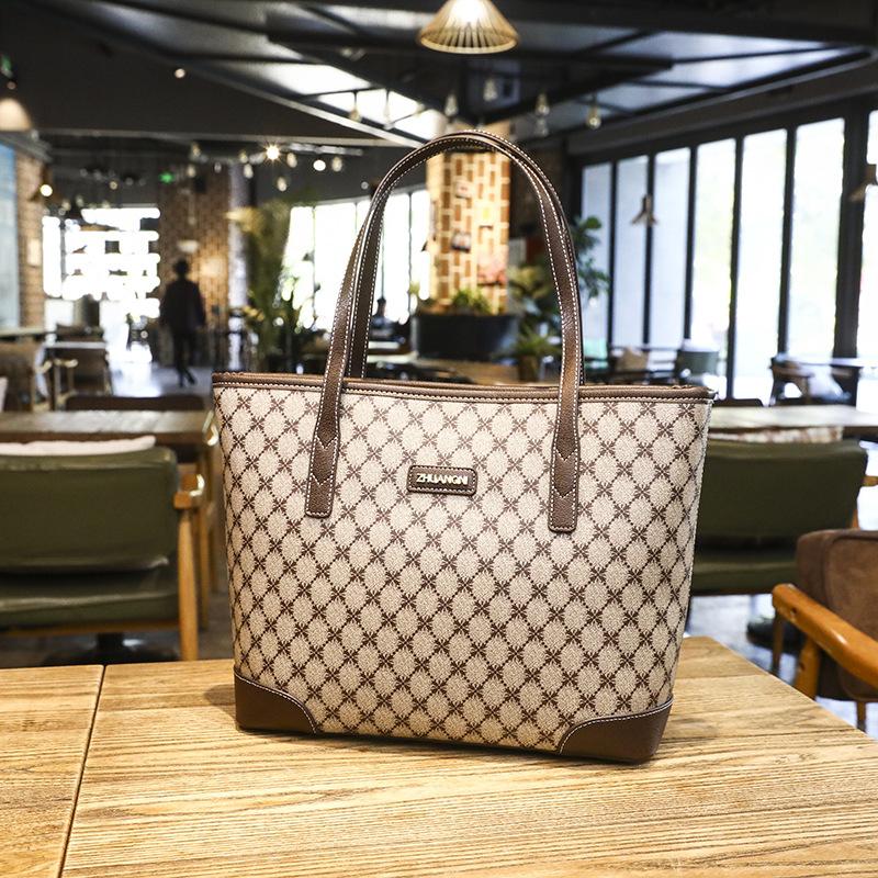 Große Kapazität Große Tasche für Damen Sommer Neu Texturiert Ein Schulter Mode Bedruckt Vielseitige Tote Handtasche