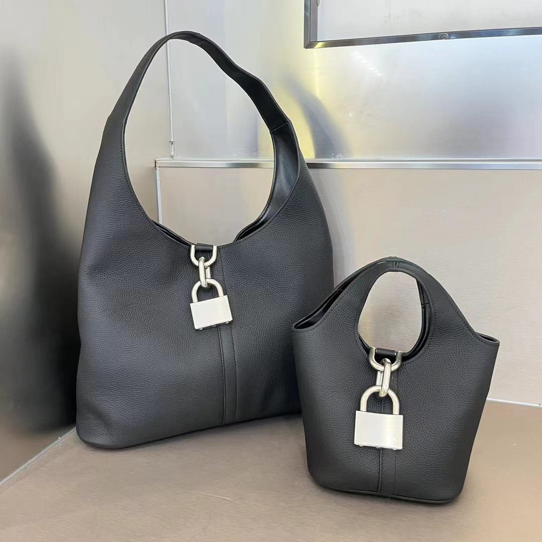 

Сумка Baga Classic Minimalist из черно-белой коровьей кожи - Рекомендована модными блогерами для универсального ношения на плече или в руке Small: 23*24*10cm