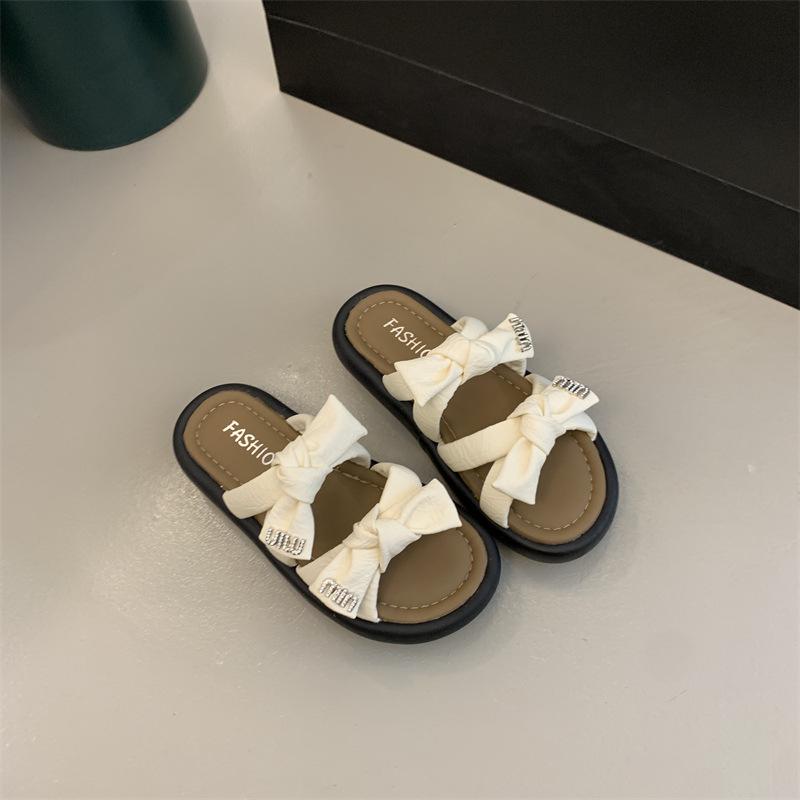 Thick bottom outer wear bow feeling seaside beach Internet celebrity cool slippers women step on shit feeling fashion fairy new