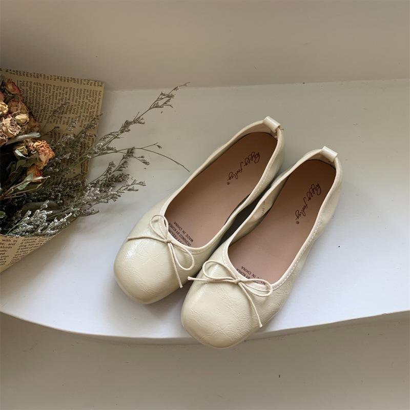 

Korean version of flat shoes soft leather ballet shoes soft sole versatile shallow mouth flat heel grandma shoes one pedal small leather shoes bow 40 бежевый