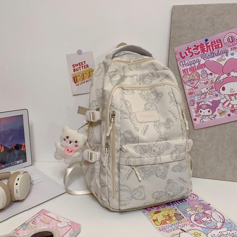 Schoolbag schoolbag female college student printed bear backpack 1011 new versatile primary school middle and high school class large capacity bag