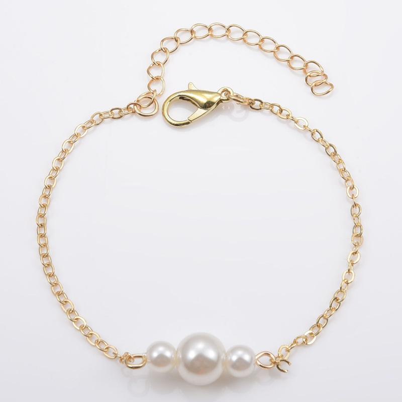 

Japanese and Korean ins light luxury fashion women s elegant pearl versatile jewelry, simple atmosphere bright white glossy pearl bracelet золотий