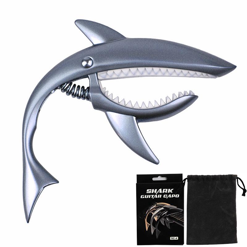 Shark Capo: Zinc Alloy Transposition Capo for Folk Guitar with Flannel Bag Packaging.