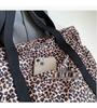 Leopard Print Canvas Tote: Large Capacity Autumn Shoulder Bag for Women, Versatile for College and Commute.