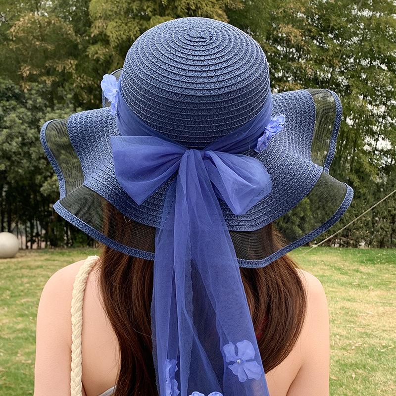 Straw hat women's summer seaside big brim sun hat new outdoor travel leisure wave three-dimensional flower streamer sun hat