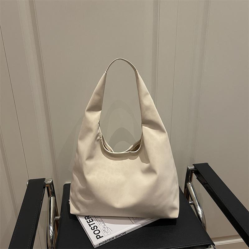 Einfache Textur trendige Damen-Tragetasche Herbst und Winter neue Tasche Mode lässige Persönlichkeit Schultertasche