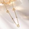 18K Gold Four-Leaf Clover Jewelry Set: Necklace, Bracelet, and Earrings in Titanium Steel with Zirconia.