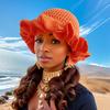 Women's Lightweight Fisherman Hat with Ruffled Brim Multi-Color Orange Tassel Design Elastic Stretch Fit for Casual & Urban Fashion