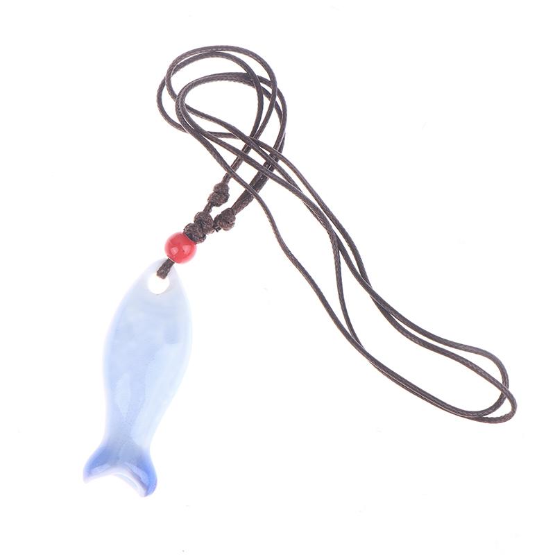 Collane Ciondolo Fischietto Pesce in Ceramica Stile Cinese Fischietto Fatto a Mano Liscio Collana con Fascino Delicato Catena per Maglione Unisex