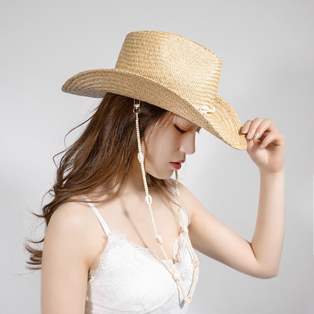 European and American fashion casual conch chain hand-woven natural grass wide-brimmed cowboy hat outdoor travel sunshade straw hat