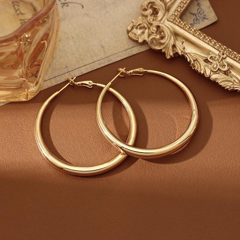 2025 Gold Large Hoop Earrings: Luxury Niche Design Studs for Women, Ideal for Round Faces