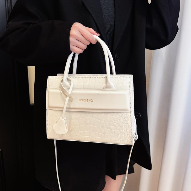 Retro fashion handbag embossed stone pattern shoulder bag new solid color texture crossbody women's bag