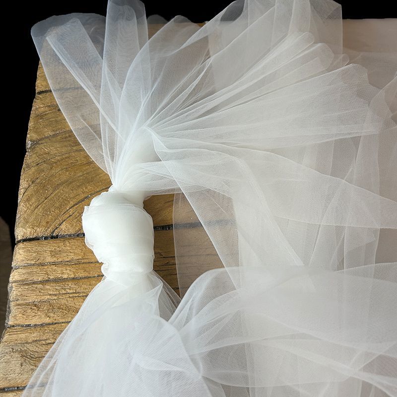 Fine transparent and soft gauze and net fabric suitable for wedding dresses formal gowns and designer clothing fabrics