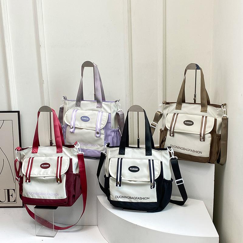 Large-capacity Japanese ins contrasting color splicing student tutoring bag canvas junior high school student class tote bag messenger bag bag