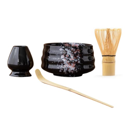 This 4-piece tea ceremony set includes a tea whisk, a 100-piece tea whisk holder, a straightening tool, a tea scoop, and a matcha bowl. It's compact a