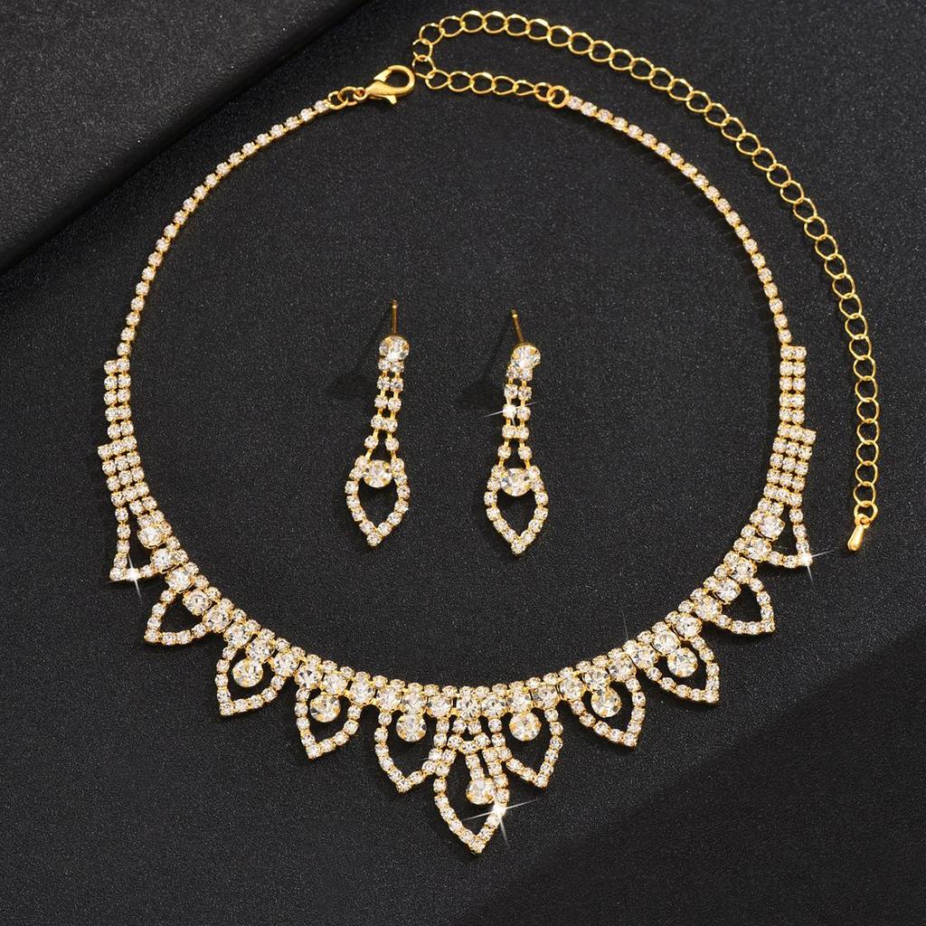 Gold Bridal Jewelry Set: Elegant Necklace, Earrings, and Bracelet for Weddings & Special Occasions.