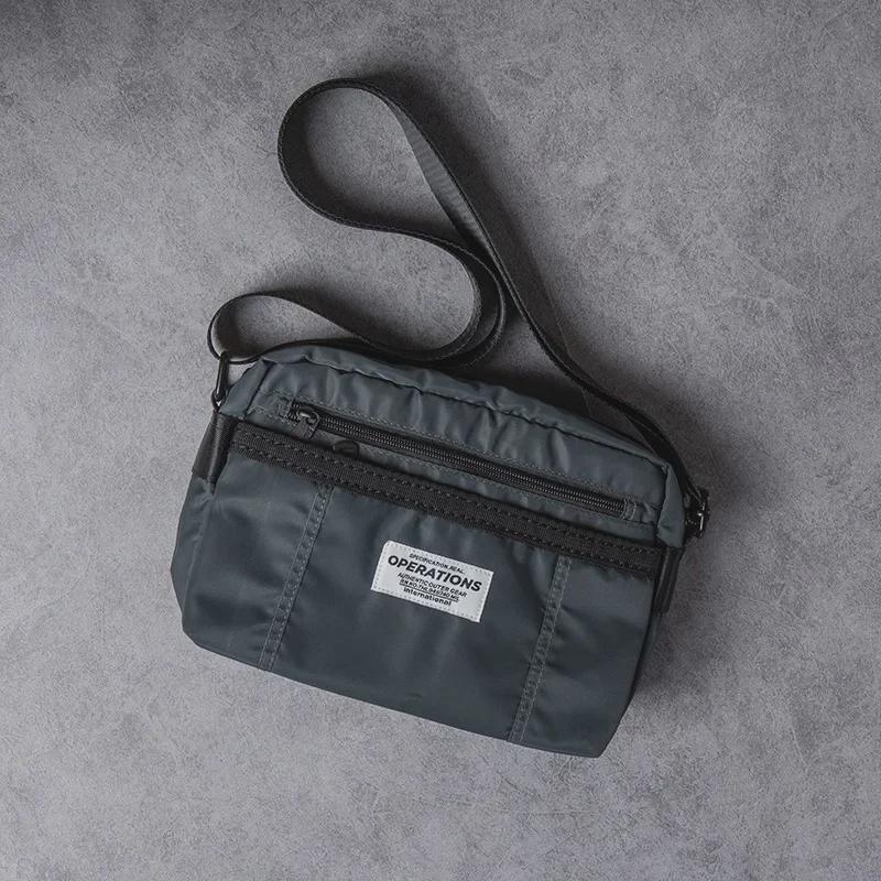 Herren Oxford Stoff Lässige Messenger Umhängetasche: Neuer Trend in der amerikanischen Street Fashion.