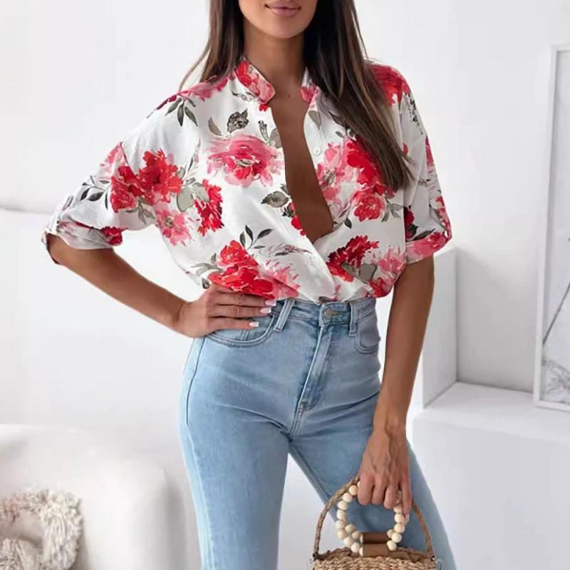 Nueva blusa holgada de manga tres cuartos con estampado y botonadura sencilla para mujer, colección primavera-verano.