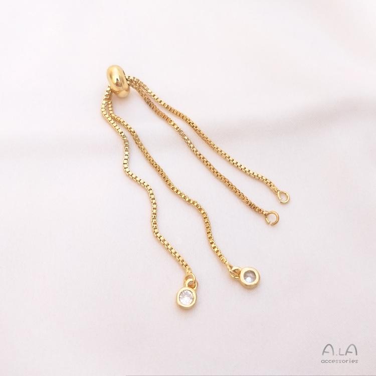 

Браслет-коробчатая цепочка из золота 14 карат с цирконами и регулируемыми силиконовыми бусинами