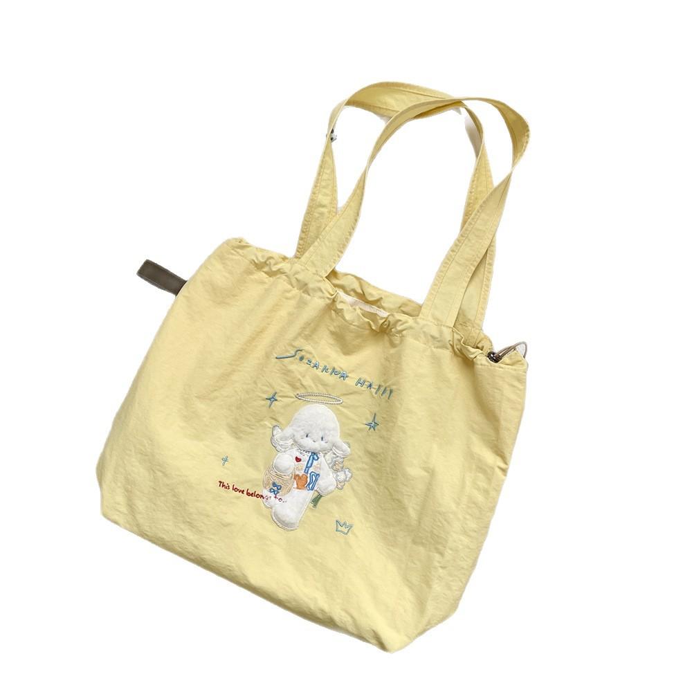 Canvas bag Large capacity women's embroidery lamb fabric bag Simple versatile drawstring bundle shoulder bag