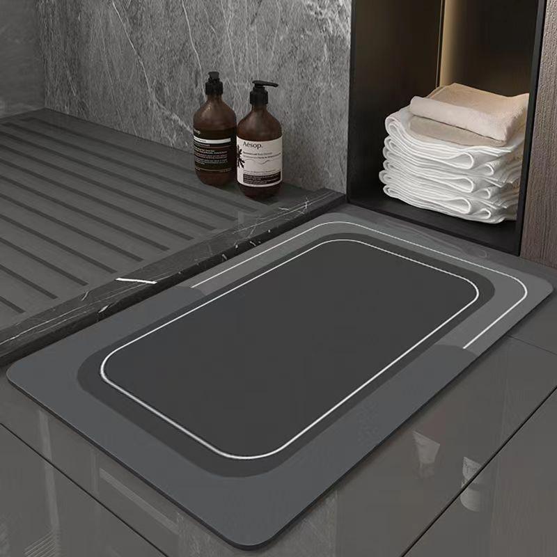 

Простой коврик для ванной комнаты, прочный впитывающий диатомовый грязевой коврик для ванной комнаты, устойчивый к грязи и износу, быстросохнущий, нескользящий коврик 40 * 60cm
