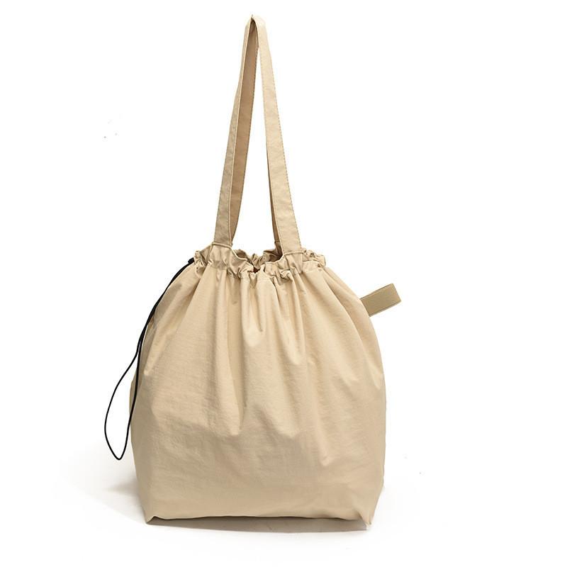 Модная городская простая нейлоновая сумка-ведро для женщин 2024 новая большая вместительная повседневная наплечная сумка хаки