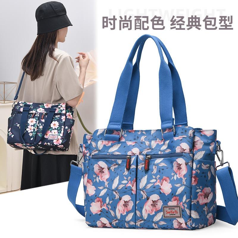 Fashion printing personalized oblique span women's bag simple and elegant shoulder bag large capacity portable go out canvas handbag