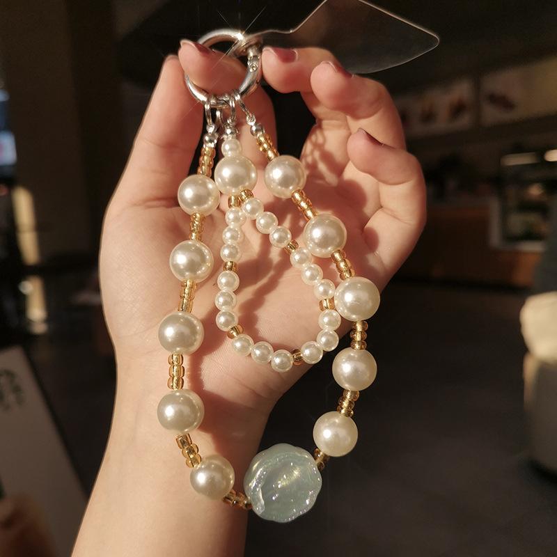 Mobile phone lanyard handmade beaded size pearl wrist chain pendant pendant women's short high-end pendant anti-loss