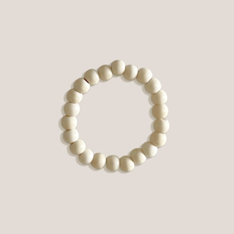 

A Little Tickle Cream Ball Bead Ring Creamball ring