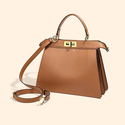 Borsa a tracolla Yujie in pelle di mucca con chiusura a torsione 2025 per donna