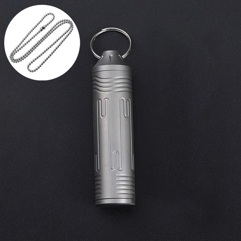 Versiegelte Kapsel aus Titanlegierung mit Halskette Wasserdichte Pillendose Outdoor Zuhause Erste-Hilfe-Anhänger Überlebensflasche Behälter