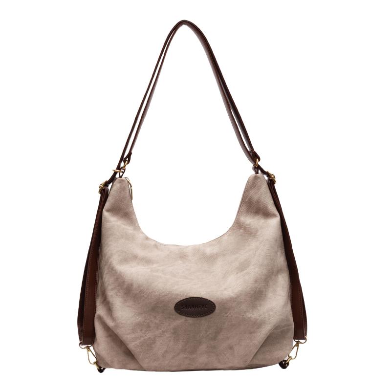 

Сумка на плече великої місткості. Жіноча сумка через плече хакі