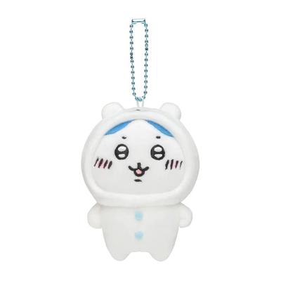 O Urso Chiikawa de Nagano usando um pequeno mini mascote, Hachiware