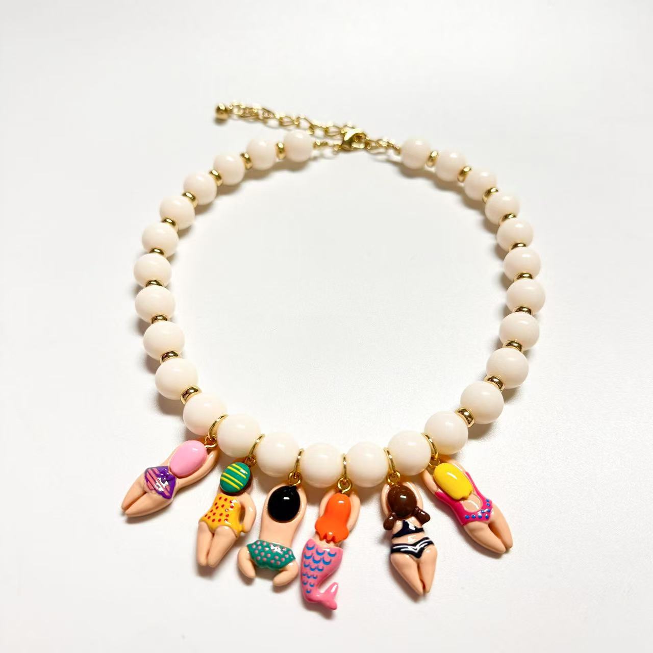 

Hot selling cross-border new fashionable personalized acrylic beads cute boys and girls swimsuit pendant necklace
