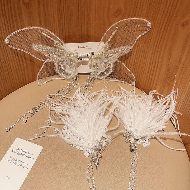 1 Pair of super fairy feather hairpin advanced sense crystal flower long fringe photo show dress hair accessories