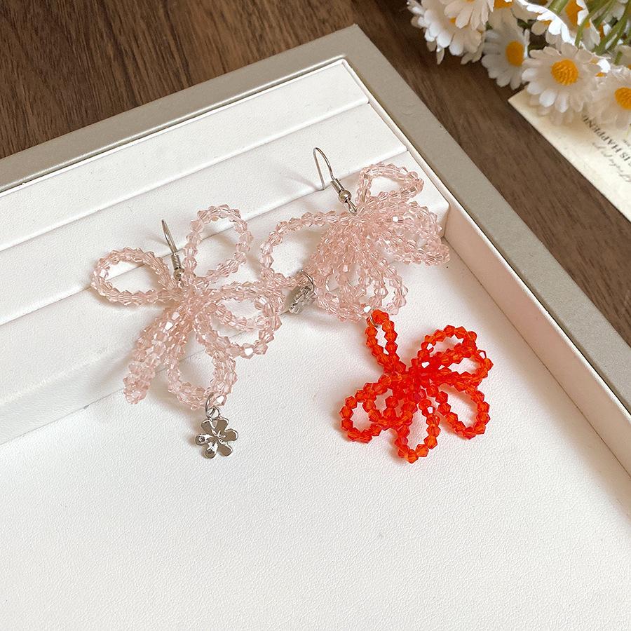 

Irregular three-dimensional flower crystal earrings fashionable and versatile high-end ear hooks niche temperament light luxury earrings