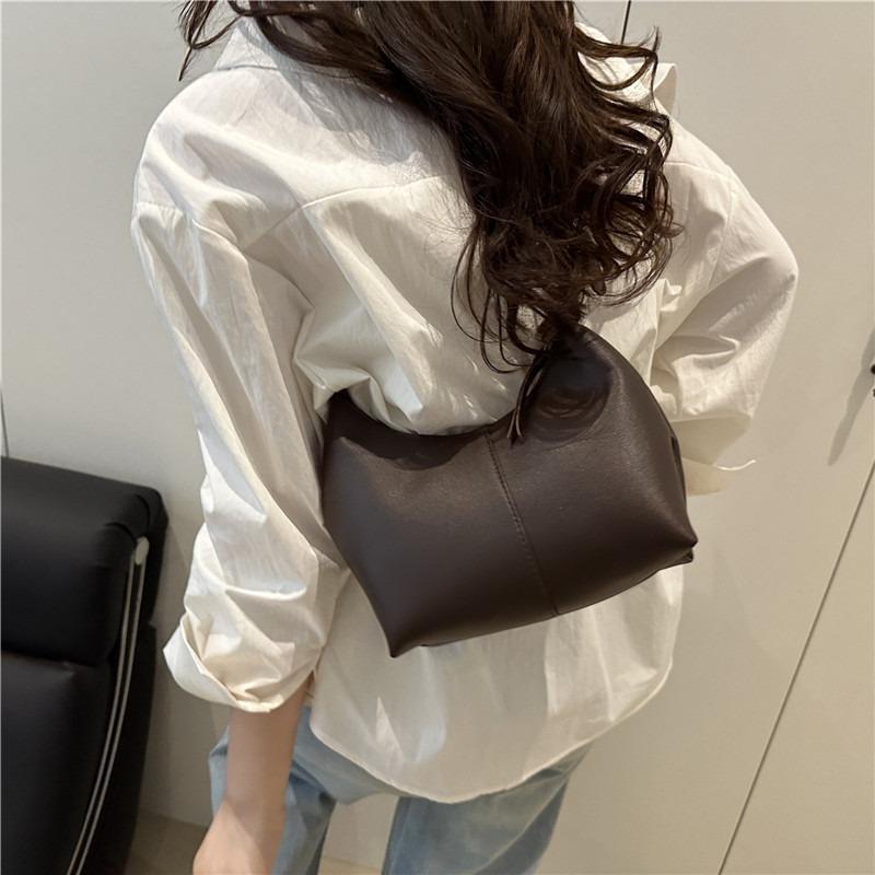 Niche simple retro shoulder messenger bag summer new fashion high sense armpit bag casual tote bag
