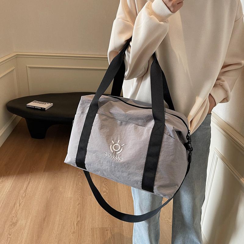 Lightweight going out handbag travel tote bag women's large-capacity clothing storage duffel bag dry and wet separation fitness bag