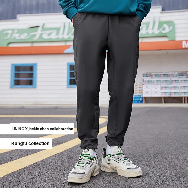 Li Ning X Jackie Chan Collaboration Kung Fu Series Solid Color Lace-Up Straight Loose Casual Pants Men Bottoms Gray AKXR473-2