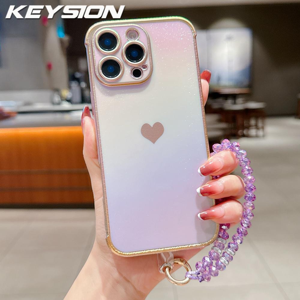 KEYSION Custodia per Telefono in TPU Colorata a Gradiente per iPhone 13 14 15 16 17 Pro Max 17 Air 16e 16 Plus Cover Posteriore Antiurto con Braccialetto di Cristallo