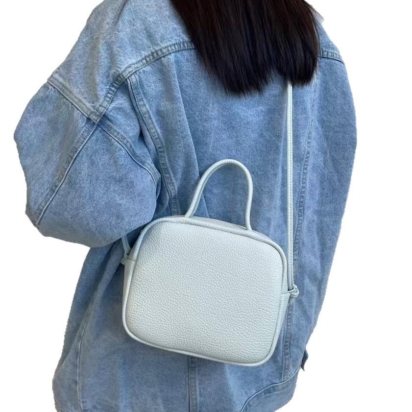 Top layer cowhide bowling bag, fashionable and versatile, retro and minimalist hand-held shoulder crossbody bag, small square bag