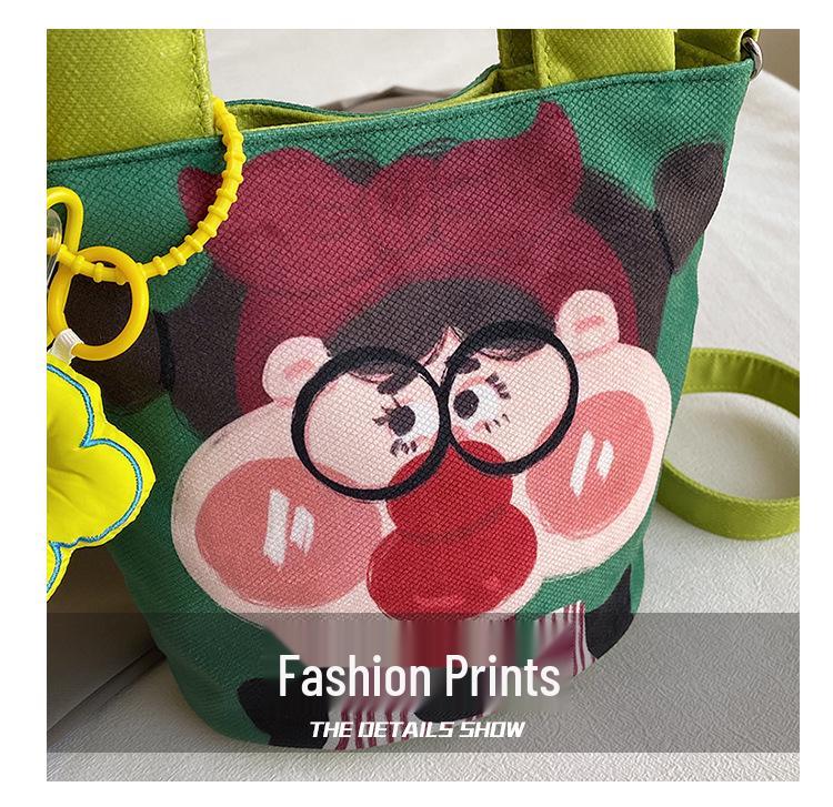 2025 Grenzüberschreitende Cartoon-Graffiti-Handtasche: Nischendesign Bucket Schulter- & Umhängetasche für Damen
