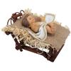 A Figurine of Baby Jesus Lying In a Manger On Hay