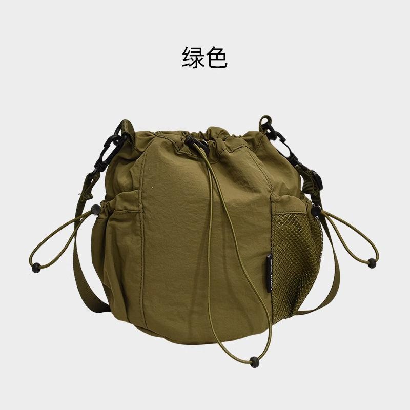 Casual mini crossbody bag women's niche light bag 2025 new mobile phone bag versatile drawstring bucket bag