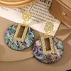 French Retro Seashell Luxury Earrings: Fashionable High-End Ear Drops for Unique Style
