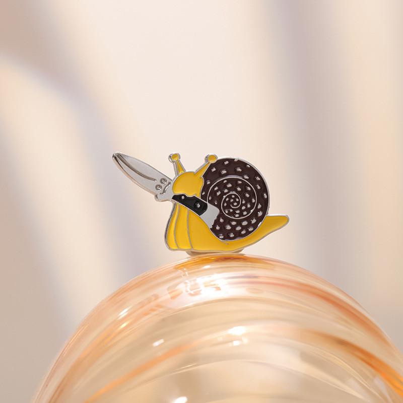 Unique And Creative Snail Shaped Brooch With Knife Design For Stylish Animal Lovers