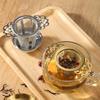 Stainless steel tea strainer with lid and teaspoon